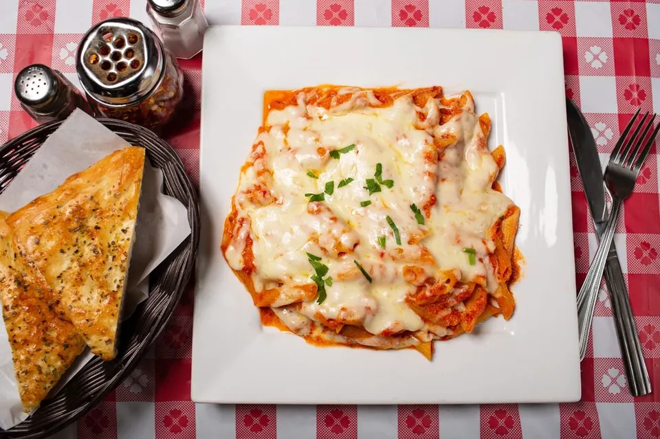 Baked pasta, served hot. Leo’s Pizza, Astoria.